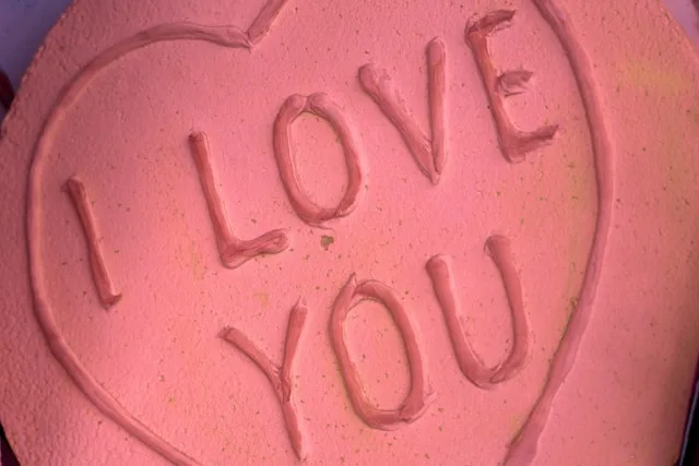 I love you on a pink Love Heart. Deep & Meaningful Long Messages